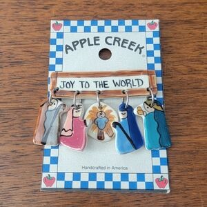 Apple Creek nativity JOY pin